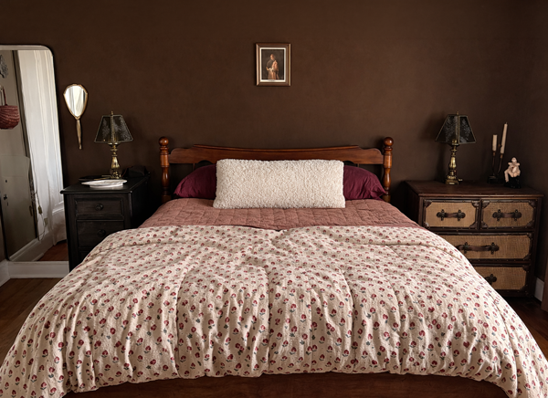 Muted Tones, Cozy Layers: The Art of a Moody Feminine Bedroom